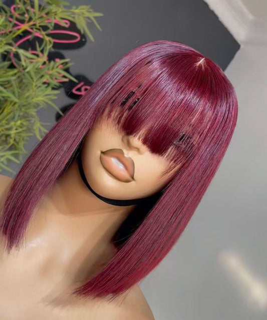 Vietnamese bone straight bob wig with a closure fringe. Color 99j 12 inches